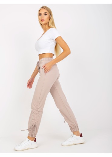 Béžovo hnedé tepláky