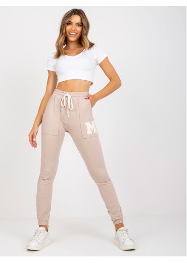 Béžovo hnedé tepláky