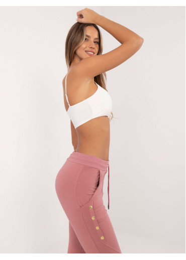 Tmavopúdrovo ružové tepláky zdobené gombíkmi