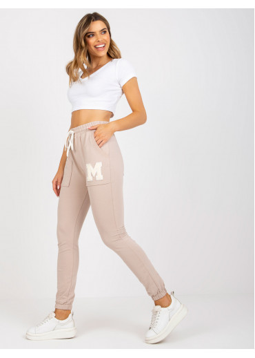 Béžovo hnedé tepláky