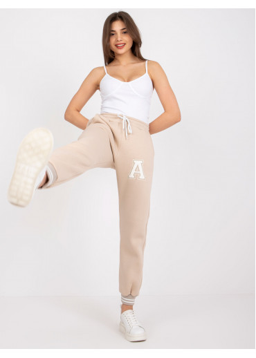 Béžovo hnedé tepláky