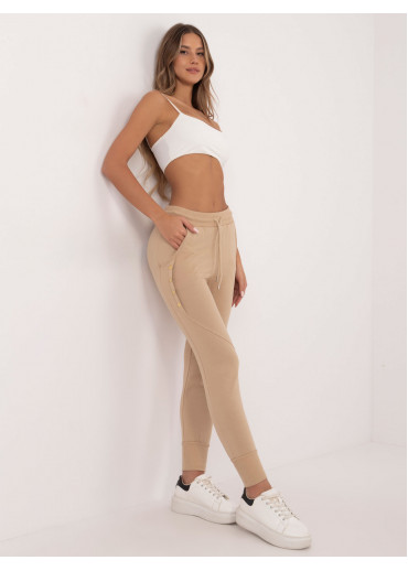 Béžovo hnedé tepláky zdobené gombíkmi