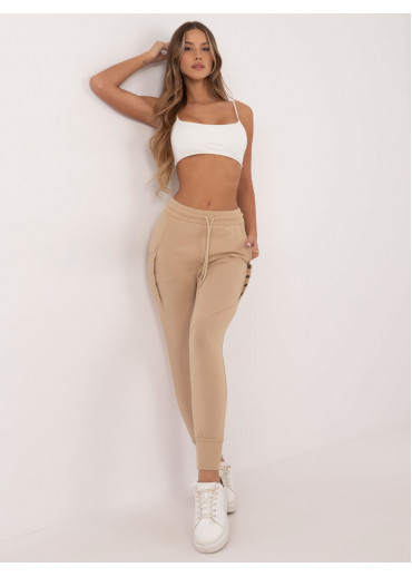 Béžovo hnedé tepláky zdobené gombíkmi