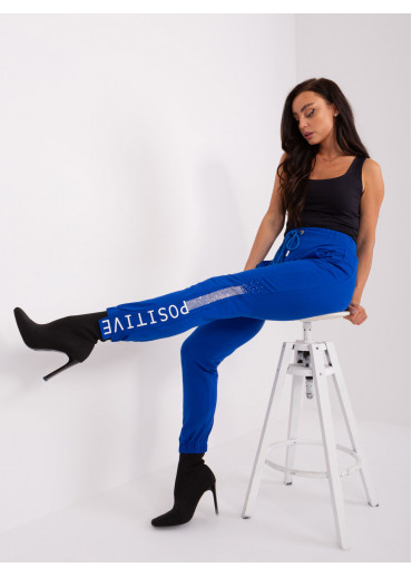 Kobaltovo modré tepláky s lampasom