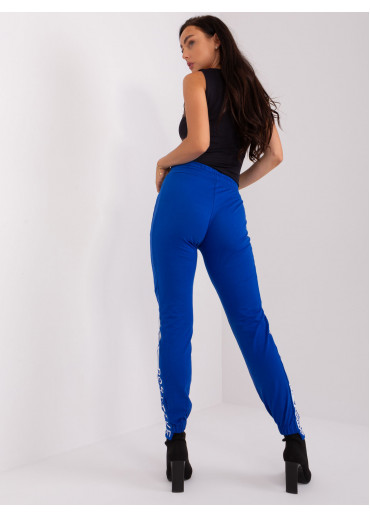 Kobaltovo modré tepláky s lampasom